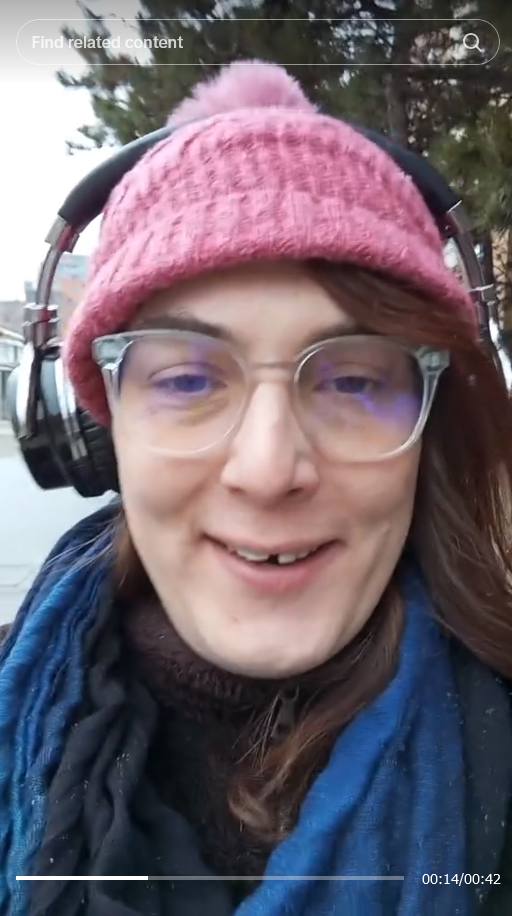 Lilithe walking through snow making a vlog on Tiktok